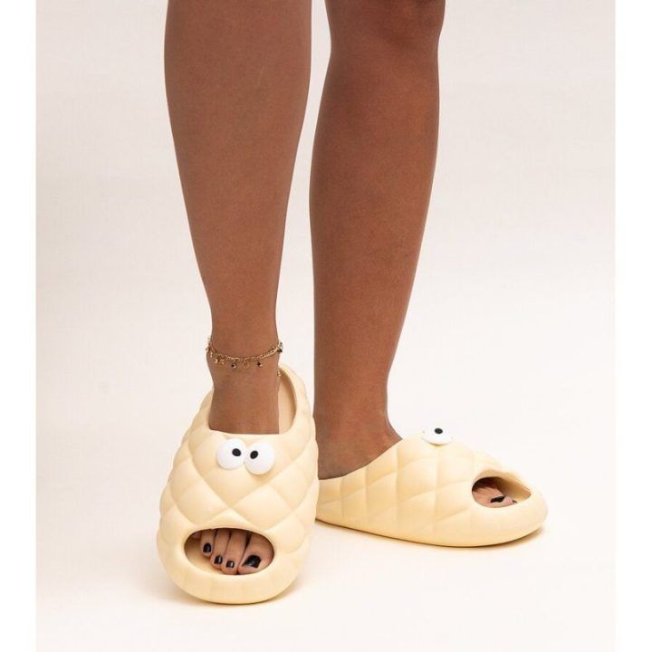 Smėlio spalvos Crocs“ tipo šlepetės su Gorgonės akimis