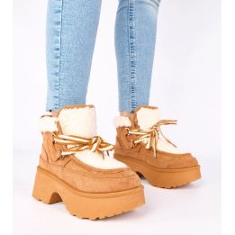 Sniego batai su platforma ir kailiu Ziza – šilumai ir patogumui žiemos dienomis.